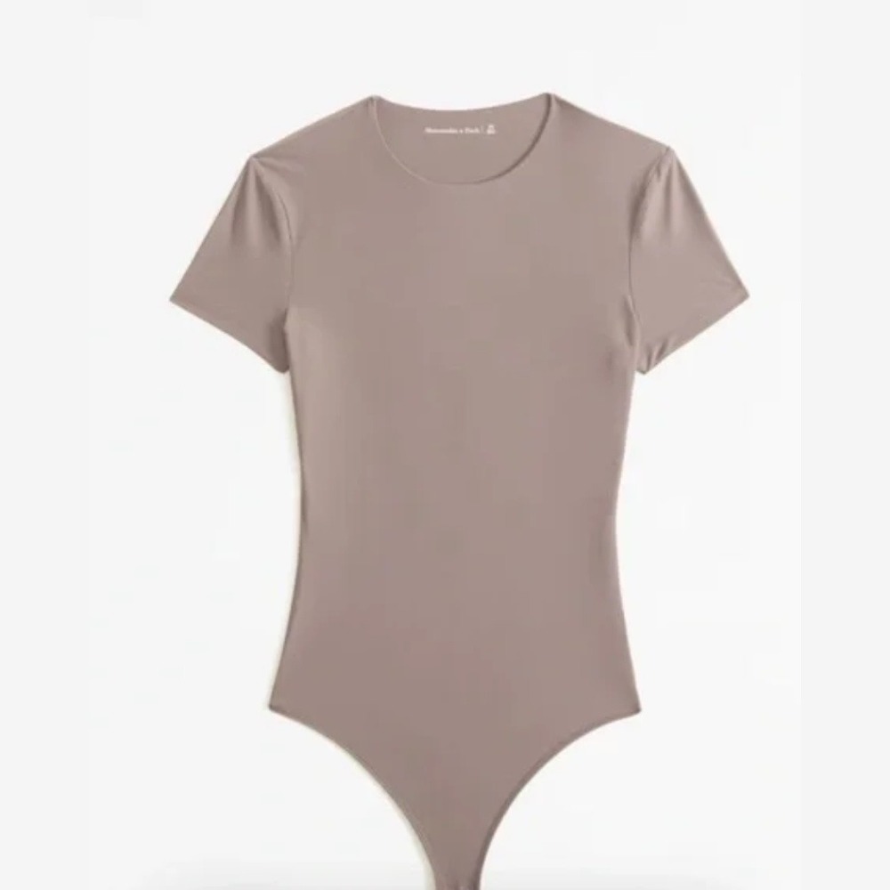 Abercrombie | Seamless Cotton-Blend Short Sleeve Thong Bodysuit in Tan
